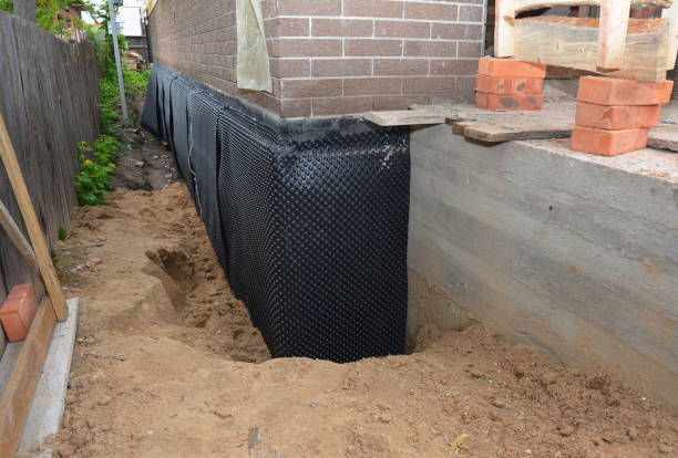 Happy homeowners after waterproofing job in Edwardsburg